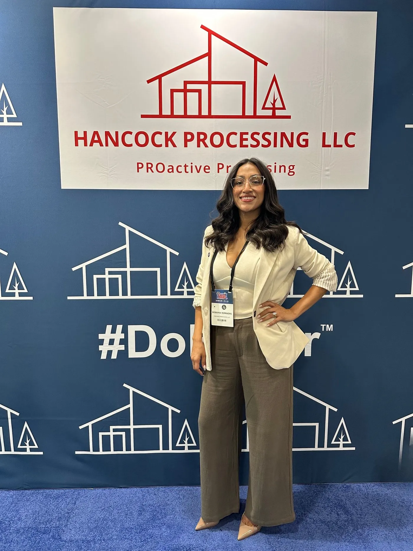 A Hancock Processing team member at the Do Better wall, recruiting experienced mortgage processors